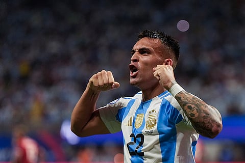 Lautaro Martinez celebrates scoring a goal against Canada